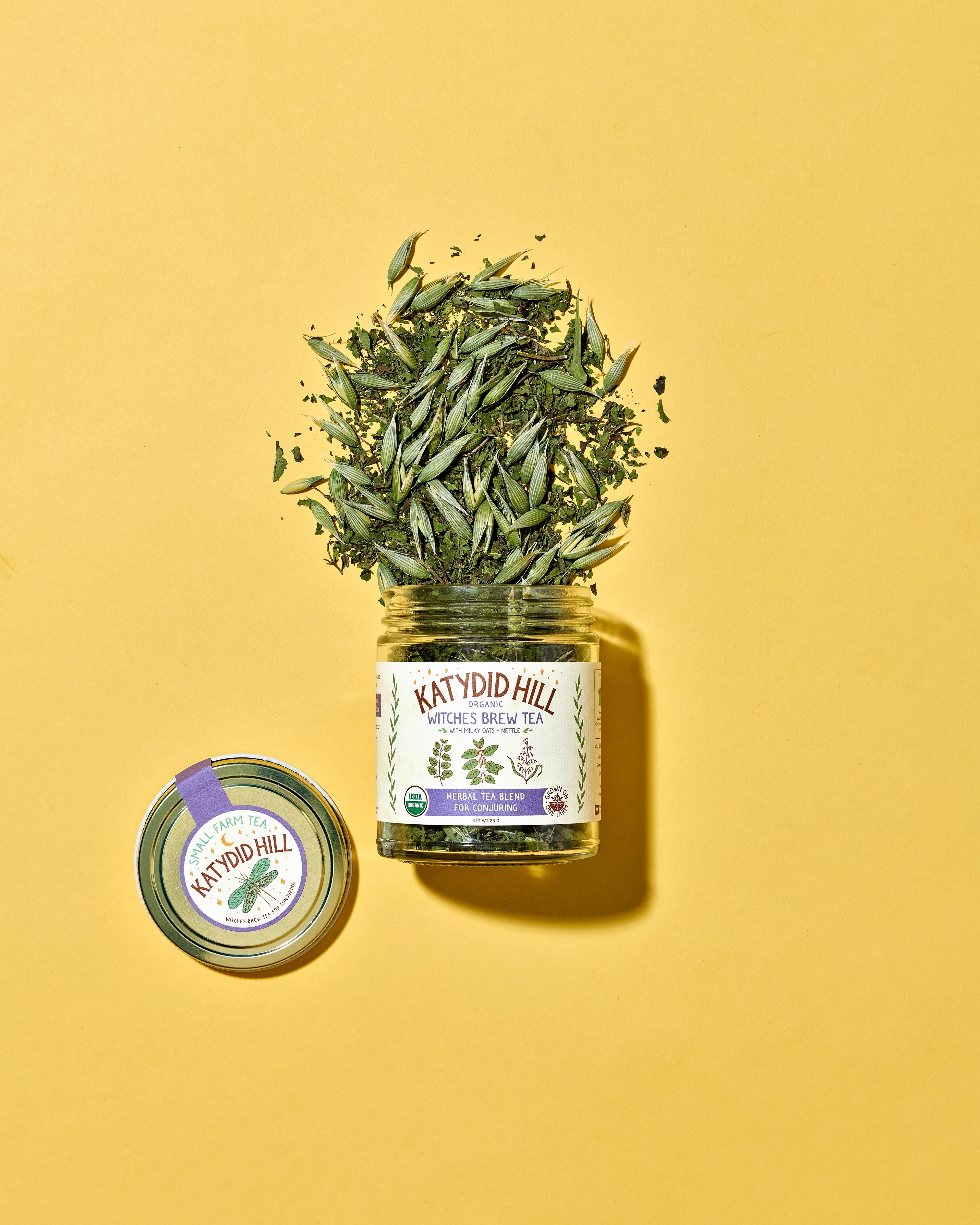 Jar of witches grew herbal tea showing loose tea. Herbal Tea blend for conjuring with milky oats and nettle.