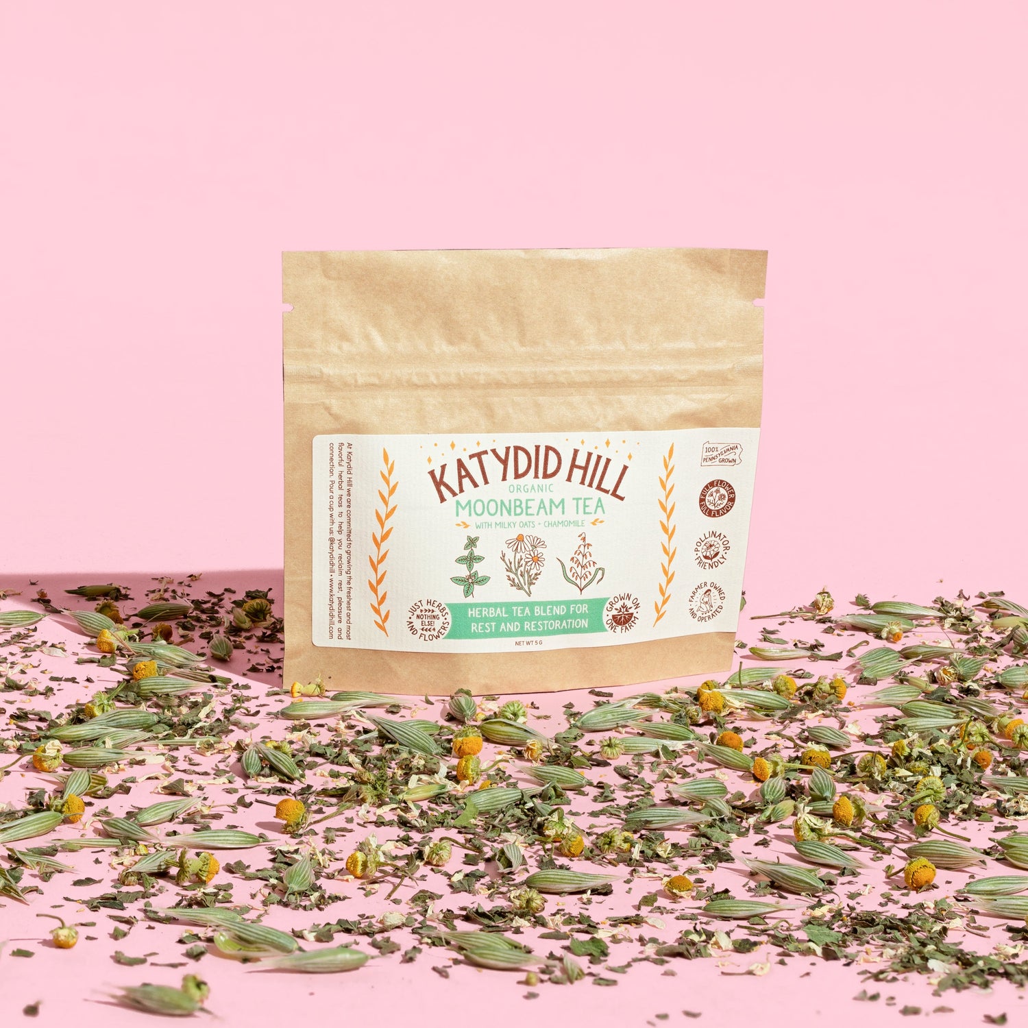 moonbeam tea sample pack with loose herbs on pink background