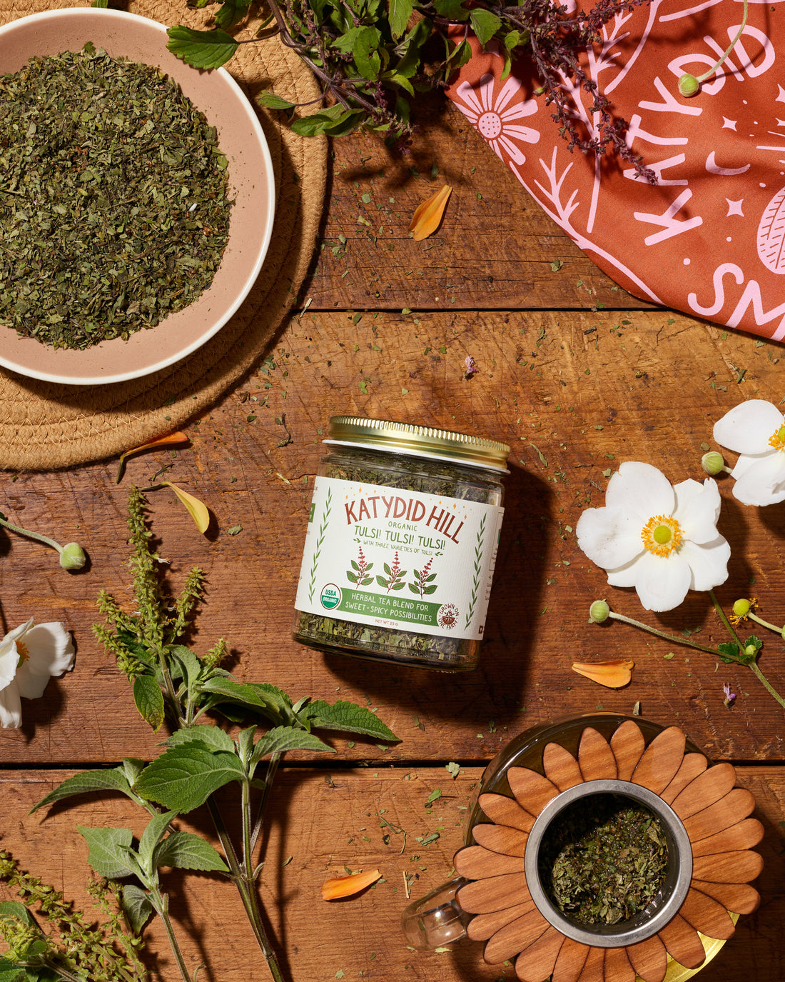 Organic Tulsi! Tulsi! Tulsi! with 3 varieties of tulsi in a glass jar.
Herbal tea blend for sweet + spicy possibilities